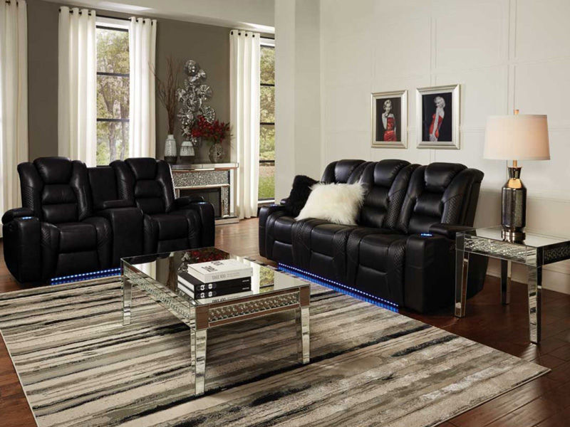 Image of black sofa and loveseat with LED lights at the bottom